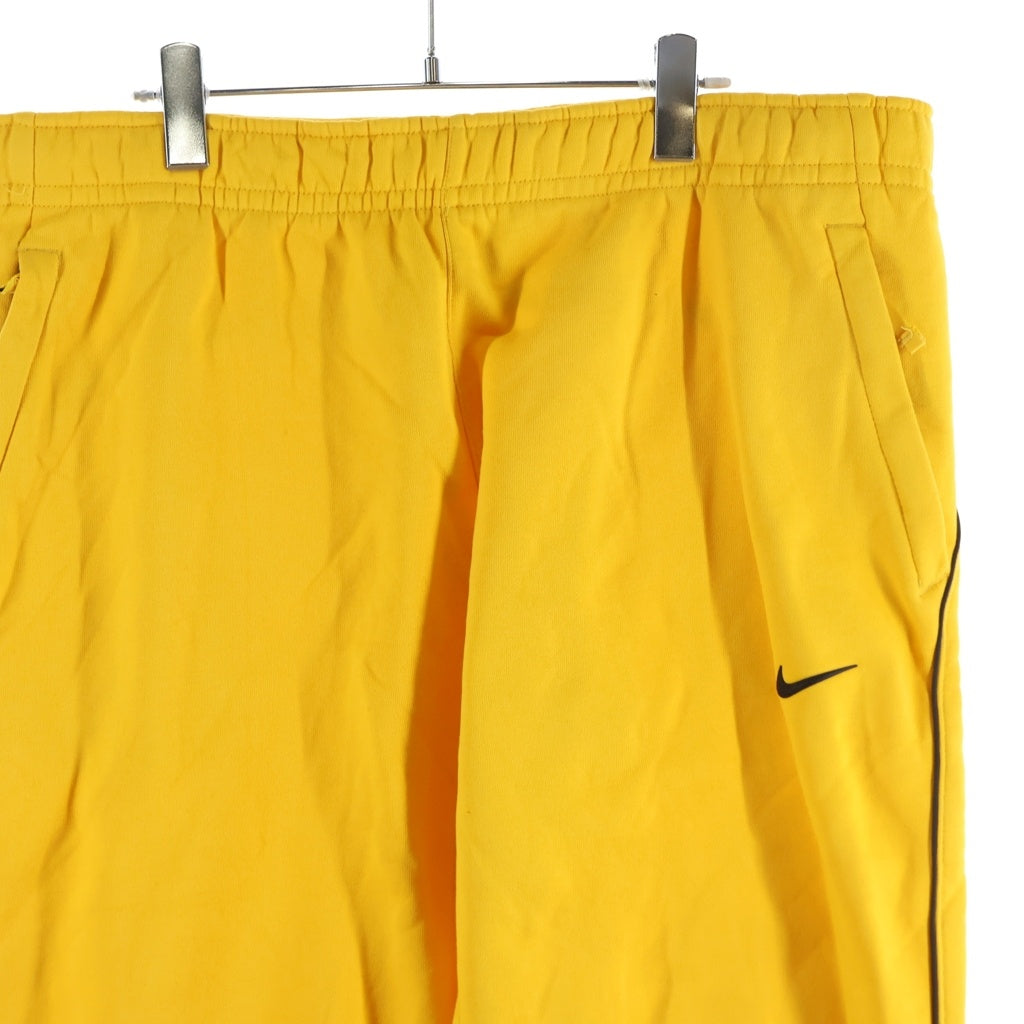NIKE(ナイキ) 20AW ×DRAKE NOCTA NRG AU FLEECE PANT ドレイクノクタ ラバーロゴ フリース トラックパンツ イエロー DA3935-739