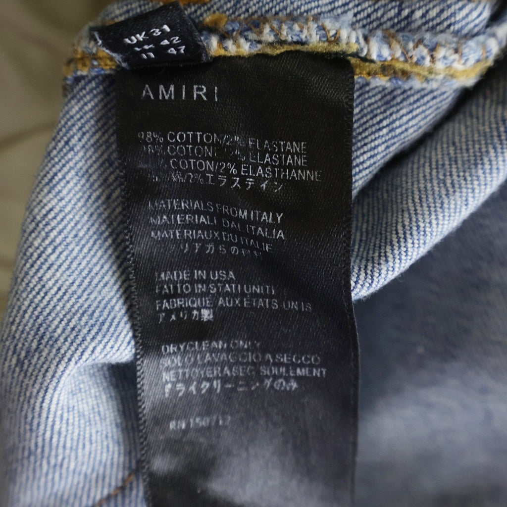 AMIRI(アミリ) ダメージ加工 ロゴペイント刺繍 ボタンフライ スリムストレート デニムパンツ スキニー インディゴ