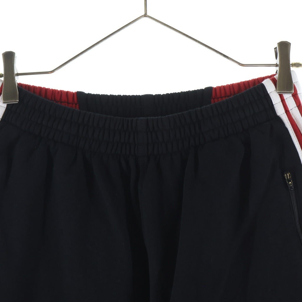 BALENCIAGA(バレンシアガ) ×adidas Baggy Sweatpants アディダス サイドライン ロゴ刺繍 バギースウェットパンツ トラックパンツ ブラック/レッド 723970 TNVN5