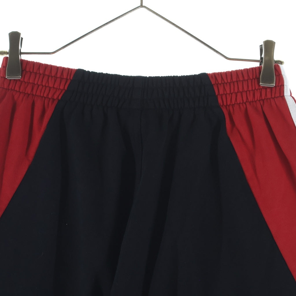 BALENCIAGA(バレンシアガ) ×adidas Baggy Sweatpants アディダス サイドライン ロゴ刺繍 バギースウェットパンツ トラックパンツ ブラック/レッド 723970 TNVN5
