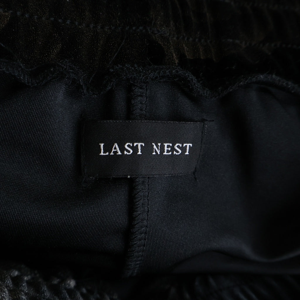 LAST NEST(ラスト ネスト) ローズプリント ベロア トラックパンツ ブラック