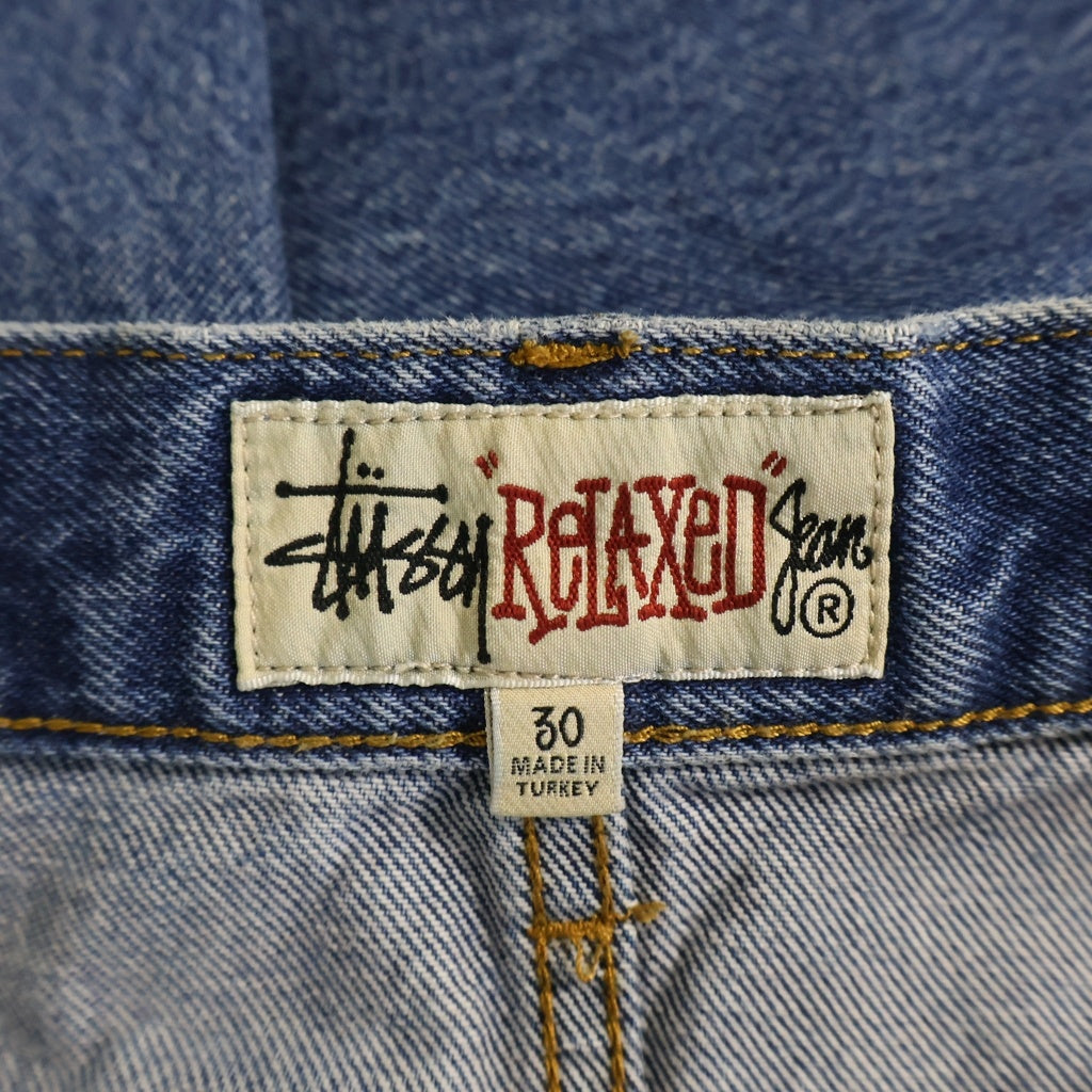 STUSSY(ステューシー) RELAXED JEAN リラックスドジーンズ ボタンフライ ワイドストレート デニムパンツ インディゴ