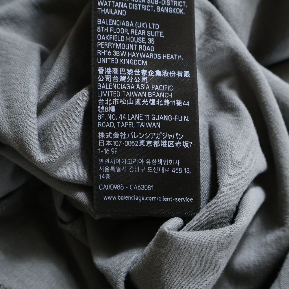 BALENCIAGA(バレンシアガ) 25SS HUMAN BEING ヒューマンビーング ダメージ加工Tシャツ 半袖カットソー グレー 824285 TSVV1