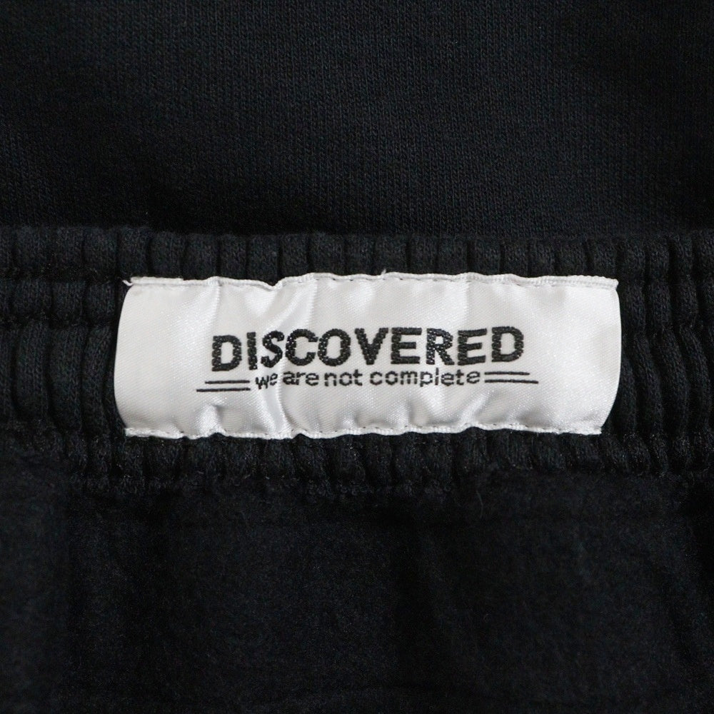 DISCOVERED(ディスカバード) 19AW ベルト付き プリント スウェットパンツ ブラック DC-AW19-RE-05