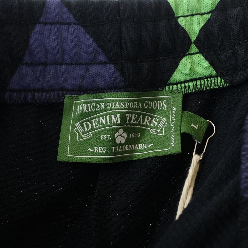 DENIM TEARS(デニムティアーズ) Intarsia Sweatpant 総柄 スウェットパンツ グリーン/パープル SS24CP002