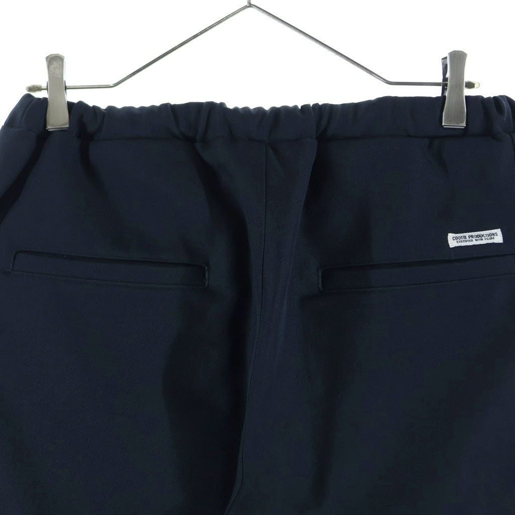 COOTIE PRODUCTIONS(クーティー プロダクションズ) Wool Saxony Track Pants ウール トラックパンツ ドローコード イージーパンツ フロントロゴ ブラック