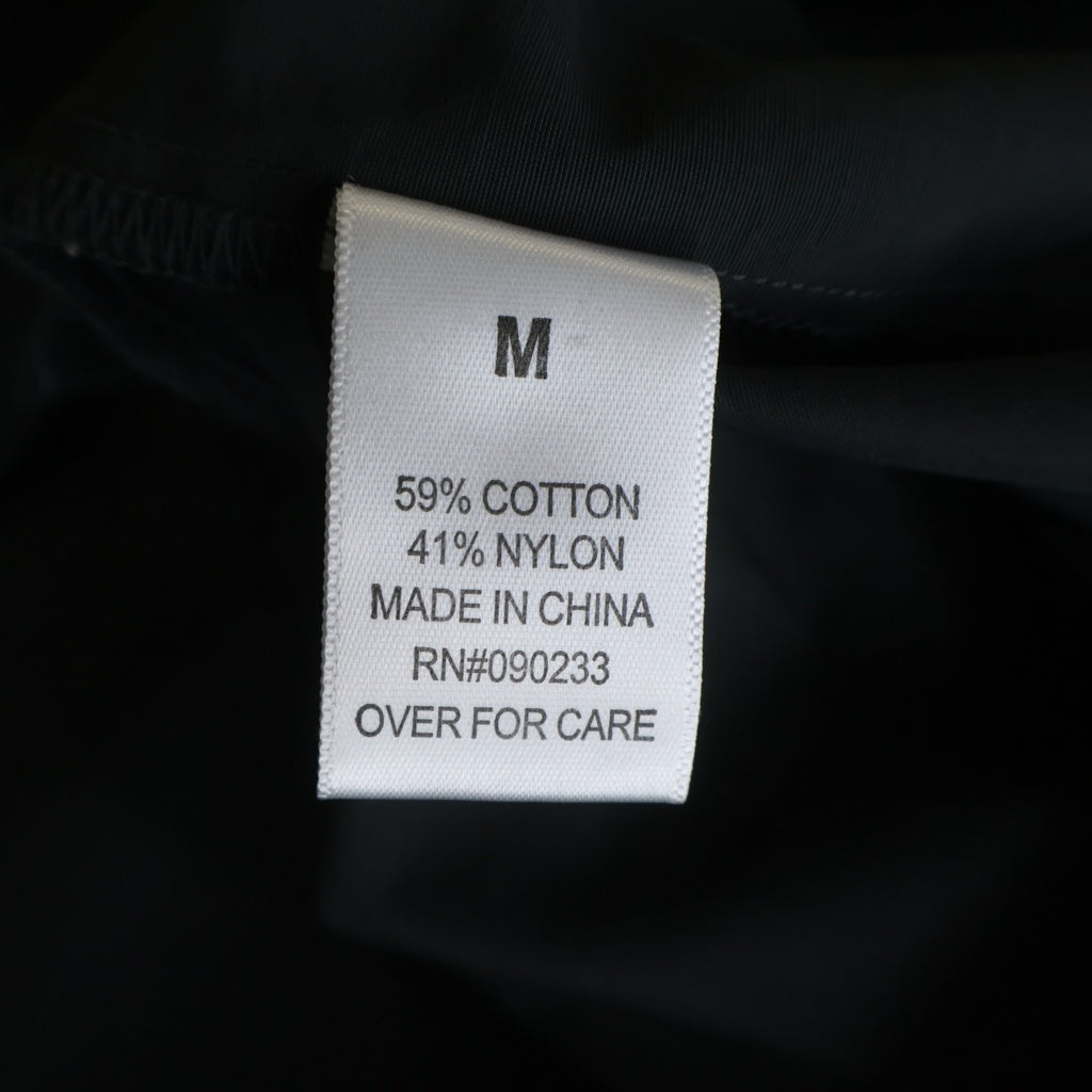 FEAR OF GOD ESSENTIALS(フィアオブゴッド エッセンシャルズ) OACH JACKET ナイロン スナップボタン ドローコード 両面ロゴプリントコーチジャケット チャコールグレー