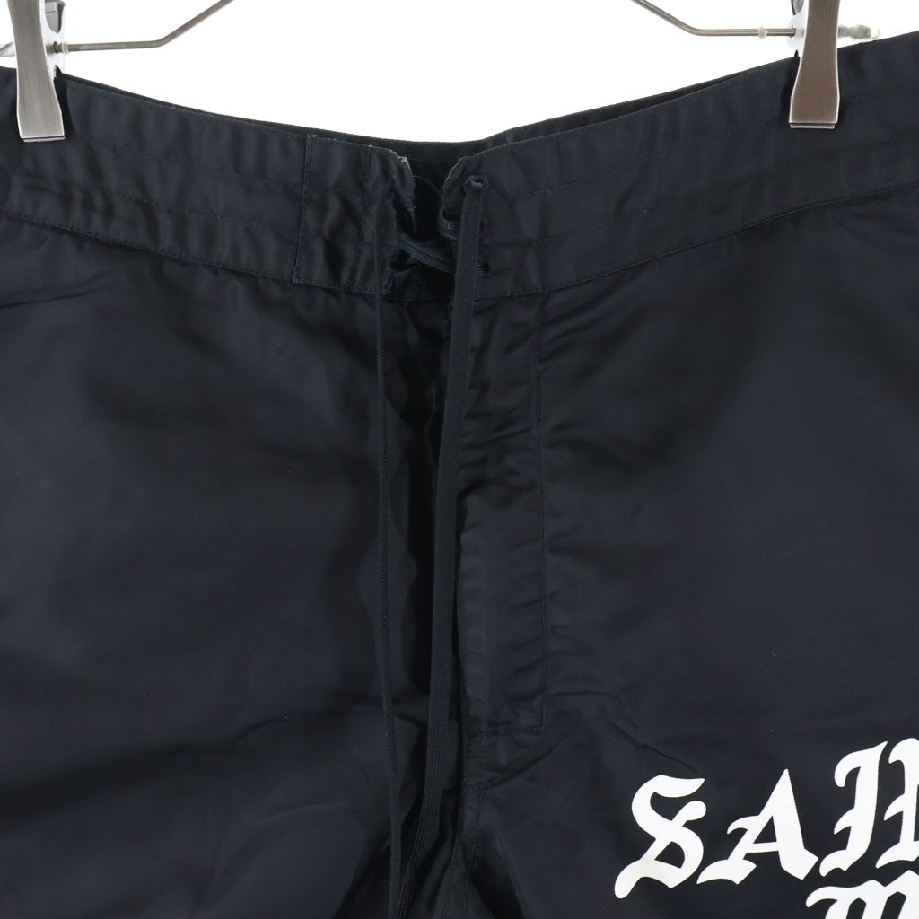 SAINT MICHAEL(セントマイケル) 23SS SWIMMING SHORT ロゴプリント ナイロン スウィムショーツ ハーフパンツ ブラック SM-S23-0000-065