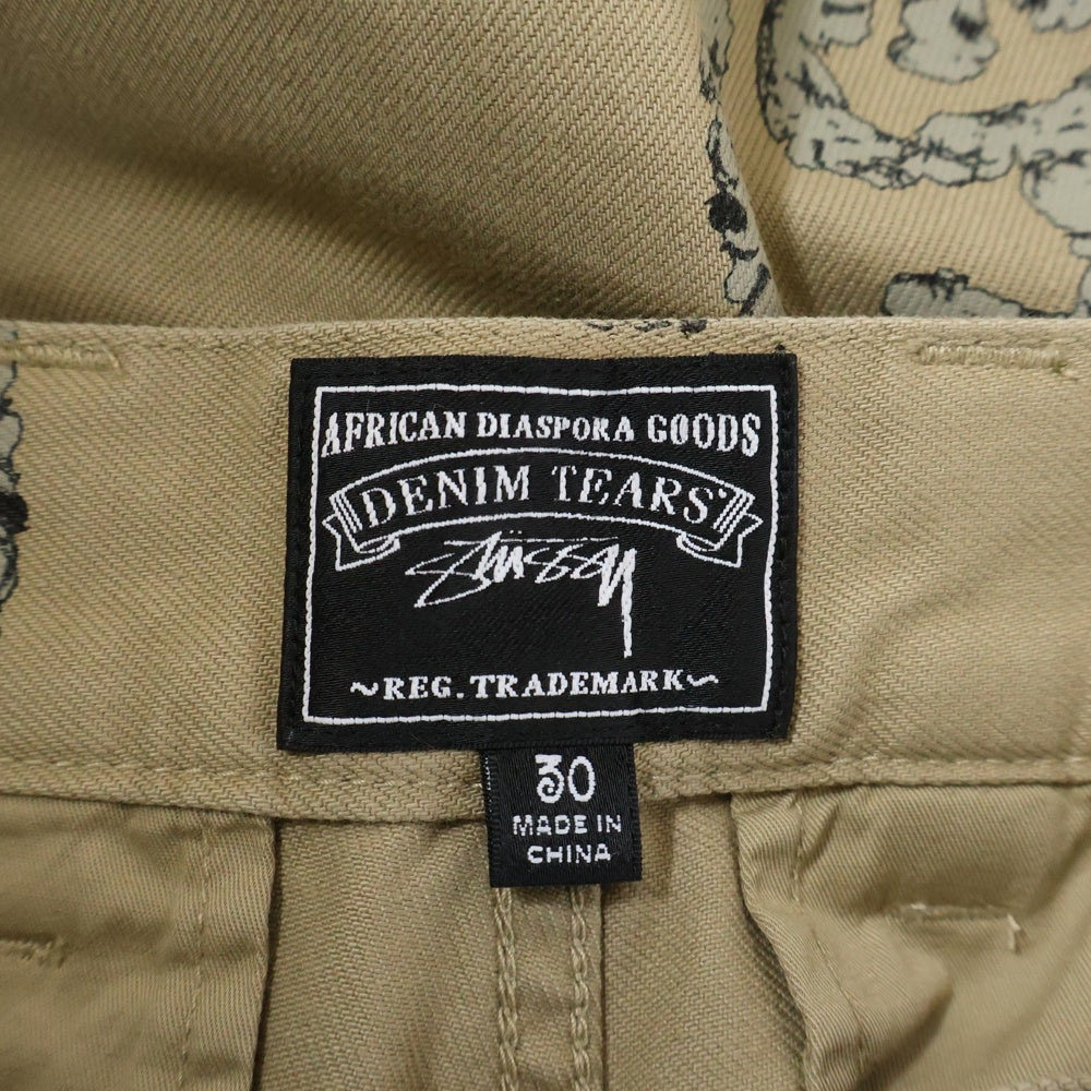 DENIM TEARS(デニムティアーズ) ×STUSSY DOUBLE S WREATH CHINO ステューシー ダブルエスチノパンツ ベージュ 25S316091
