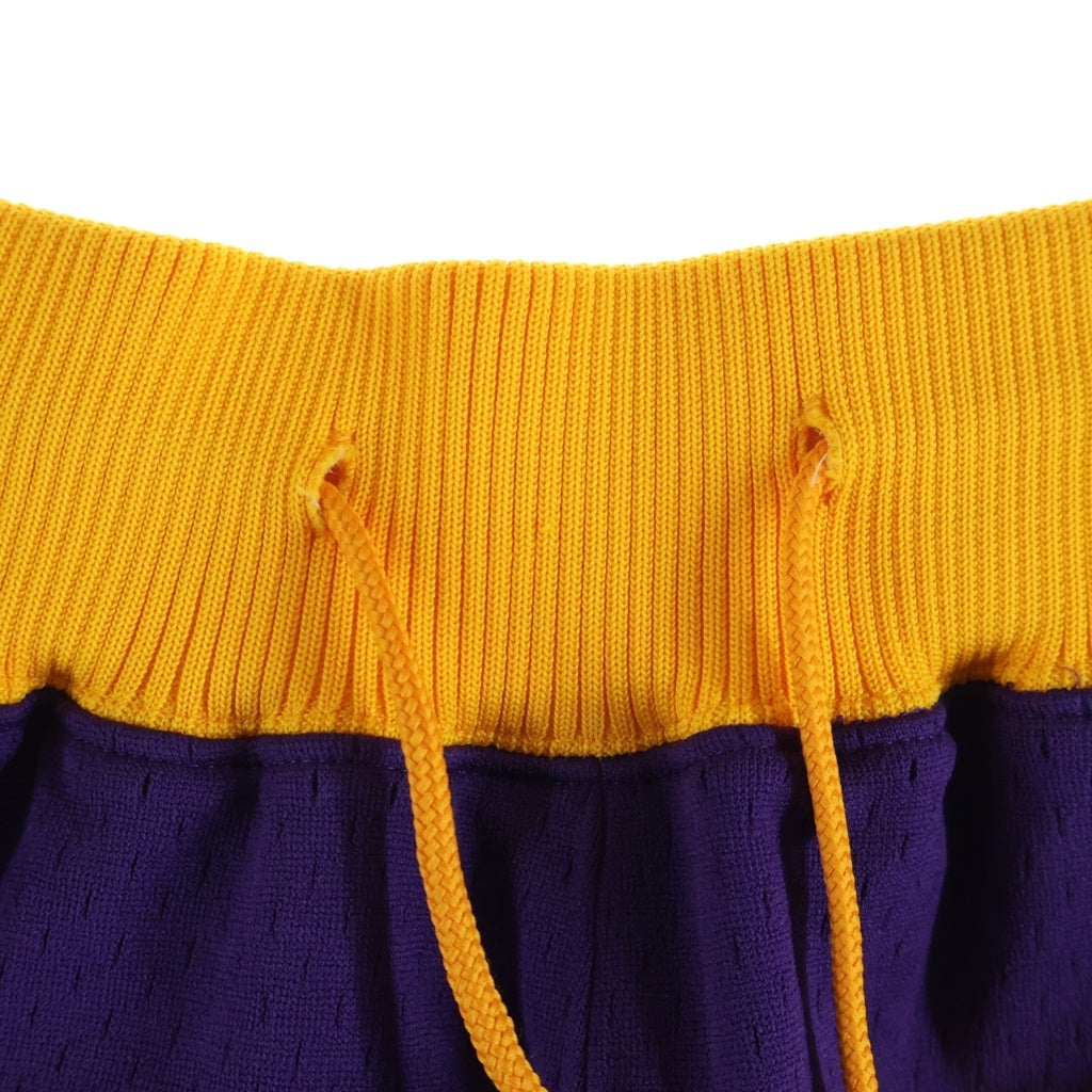 JUSTDON(ジャストドン) Mitchell & Ness Shorts Los Angeles Lakers Road 1996 ミッチェルアンドネス ロサンゼルスレイカーズ ショートパンツ SHORNG18321 イエロー/パープル