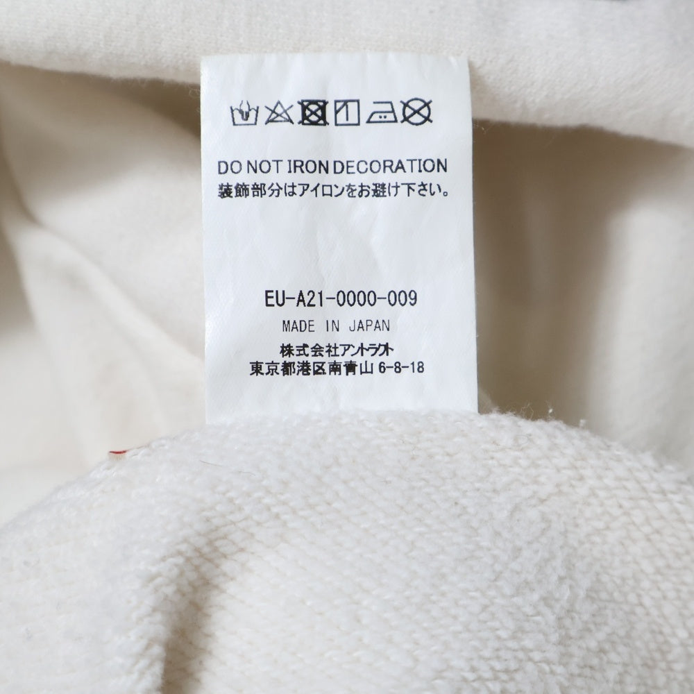 Emotionally Unavailable(エモーショナリー アンアヴェイラブル) SUPER HOODIE 総柄プリント プルオーバーパーカー ホワイト EU-A21-0000-009