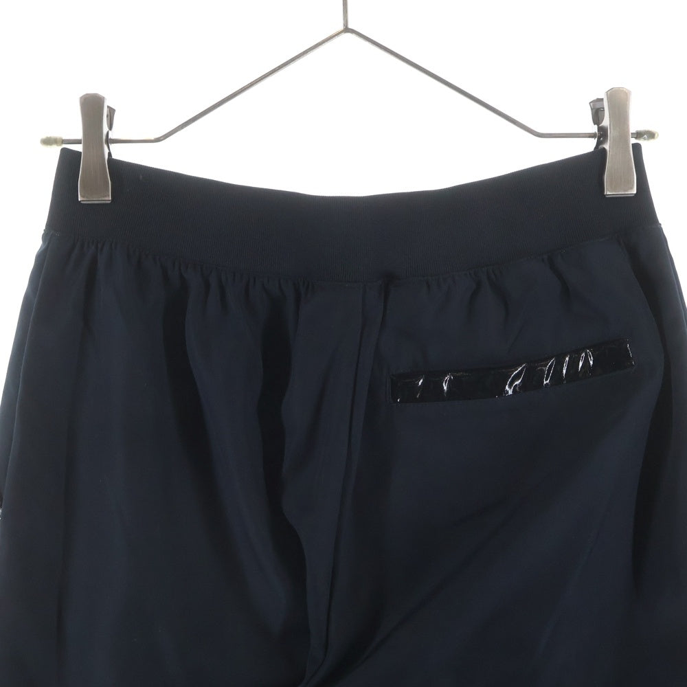 NIKE(ナイキ) フロントジップ ウインドブレーカーパンツウーブン CU6926-010 ブラック レディース