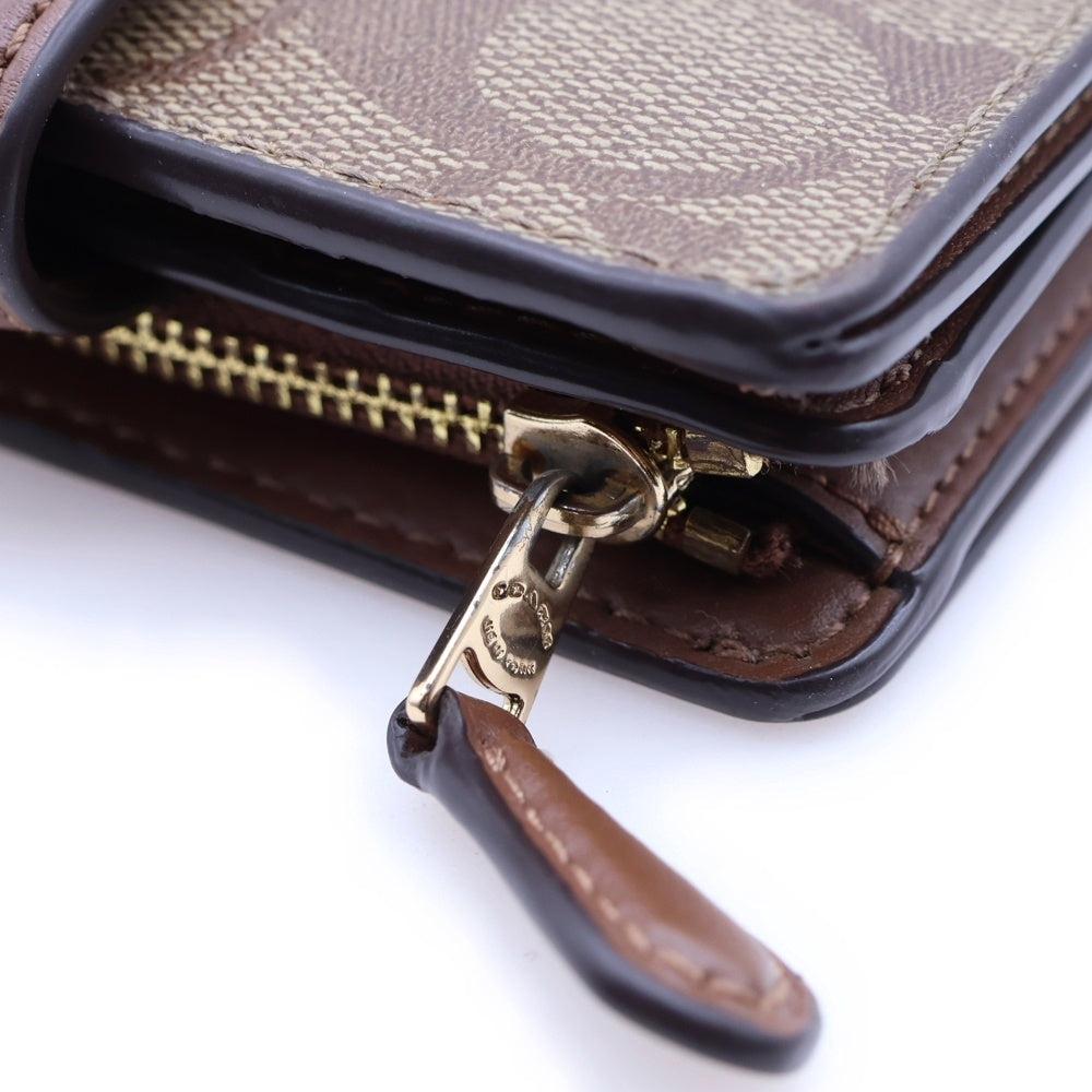 COACH(コーチ) PVC シグネチャー 二つ折り財布 ベージュ