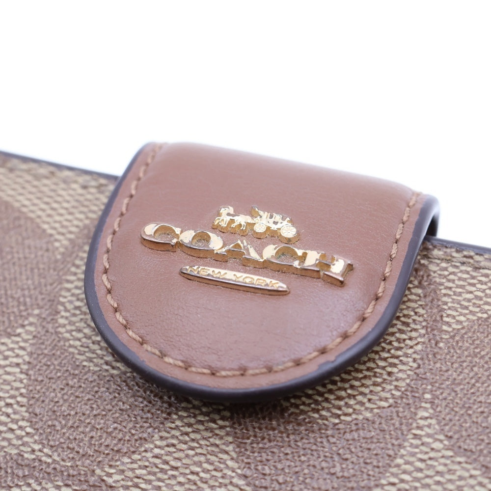 COACH(コーチ) PVC シグネチャー 二つ折り財布 ベージュ