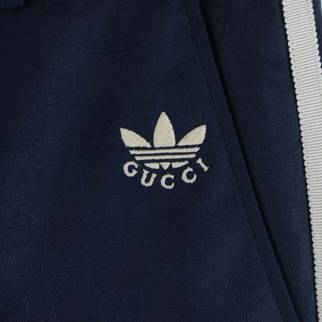 GUCCI(グッチ) ×ADIDAS トレフォイル ジャガード ロゴ 3ストライプ スラックス ネイビー