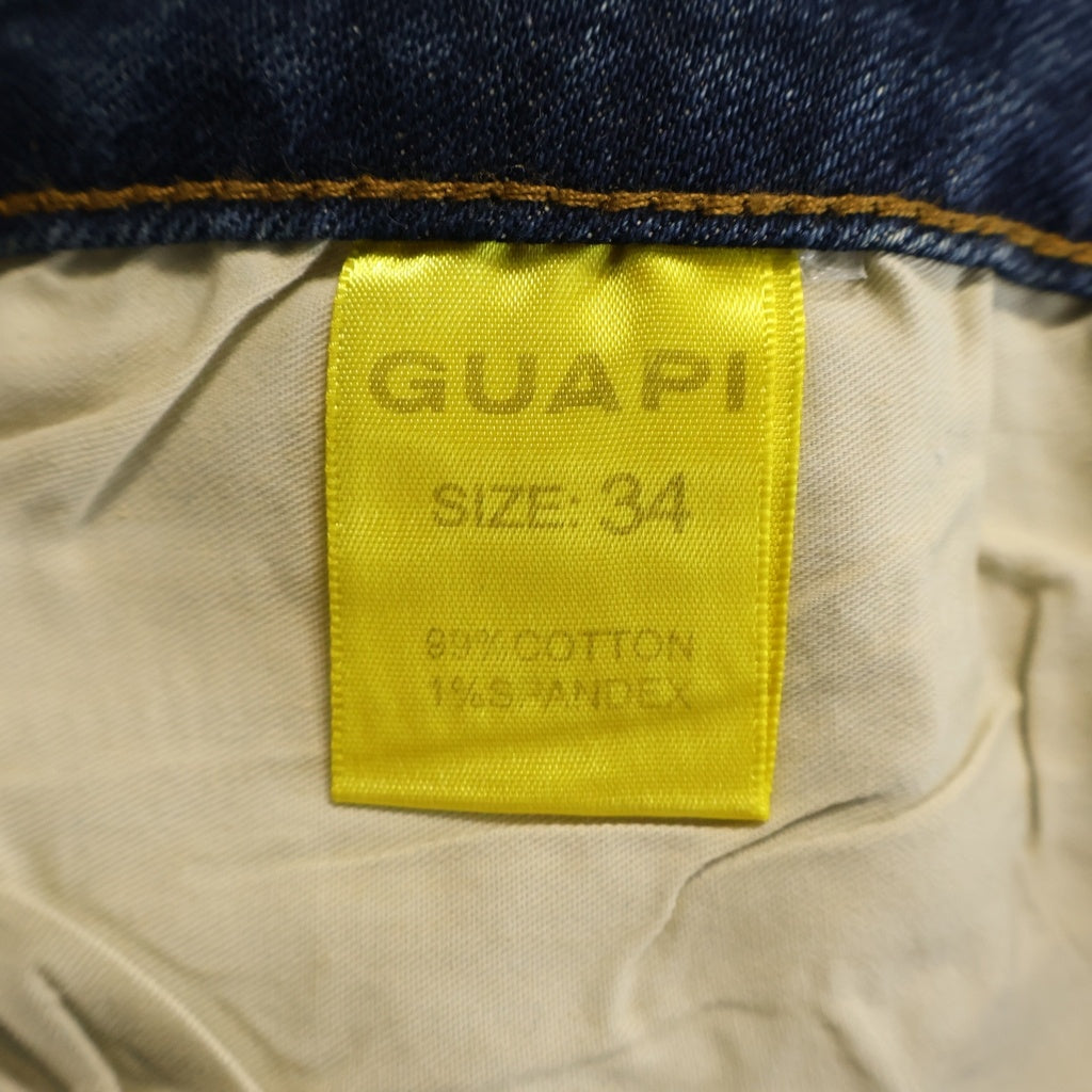 GUAPI(グアピ) ライトストーン ブーツカット フレアデニムパンツ インディゴ