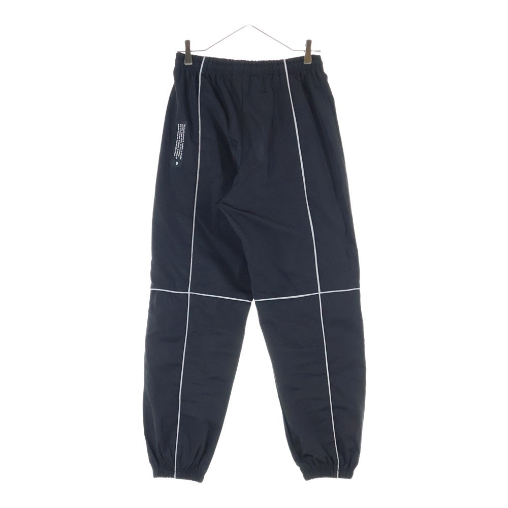 OY(オーワイ) リフレクターパイピングパンツ ロゴ刺繍入り ナイロンパンツ ブラック