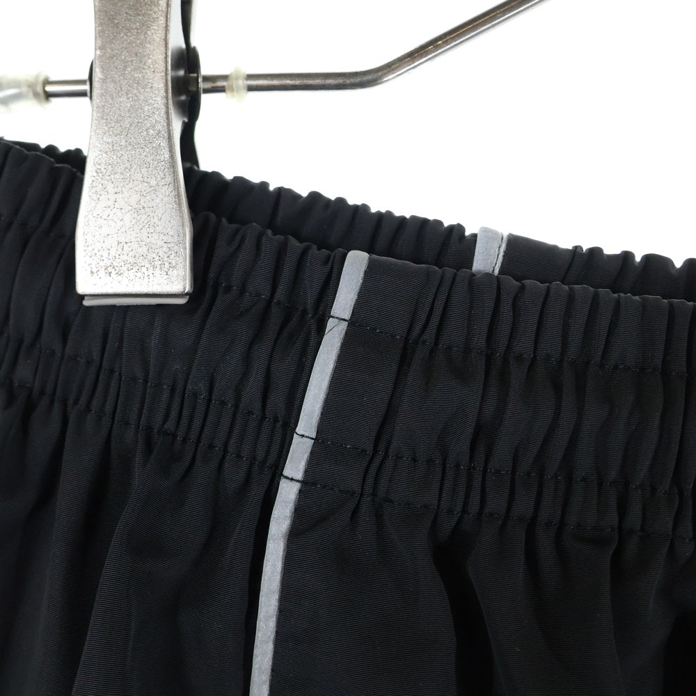 OY(オーワイ) リフレクターパイピングパンツ ロゴ刺繍入り ナイロンパンツ ブラック