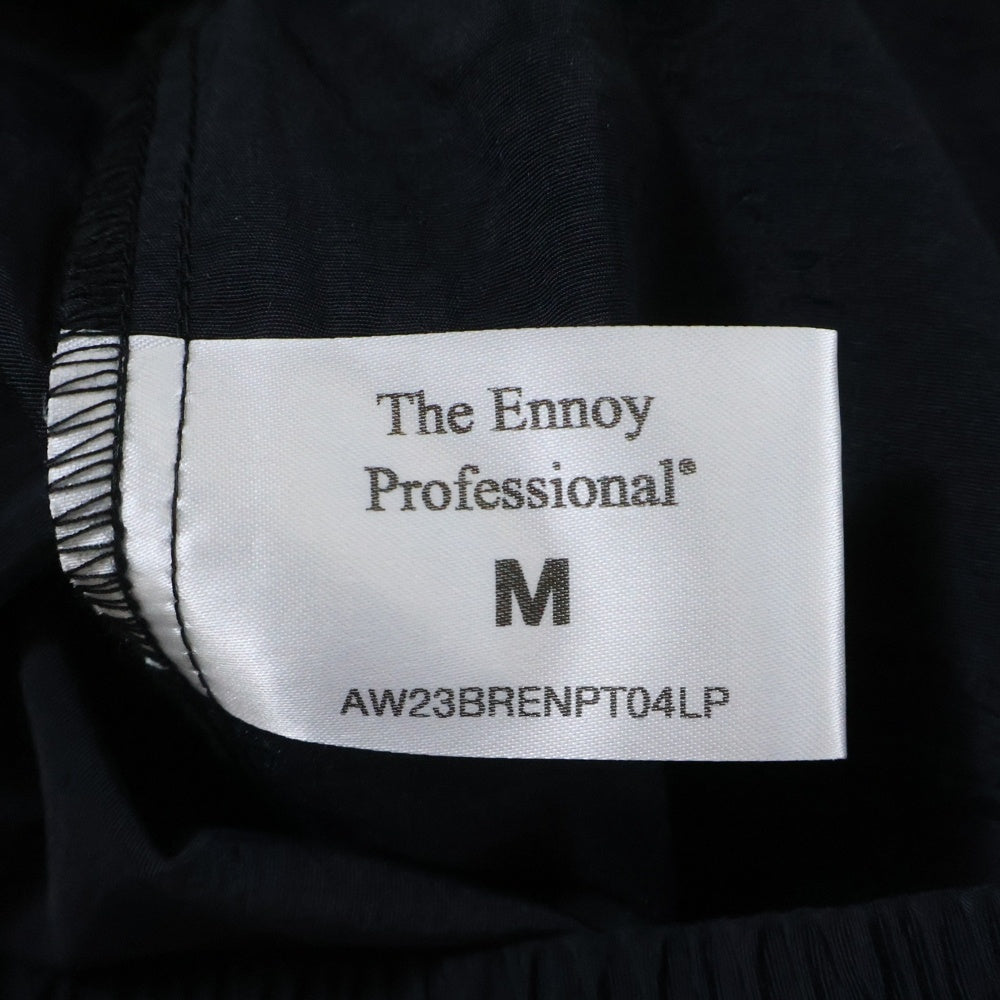 The Ennoy Professional(エンノイプロフェッショナル) 23AW NYLON TRACK PANTS ロゴ刺繍 ナイロン トラックパンツ ブラック AW23BRENPT04LP