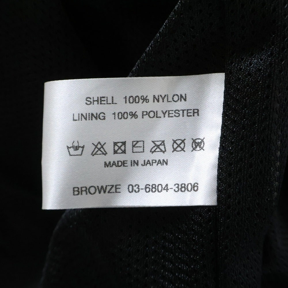 The Ennoy Professional(エンノイプロフェッショナル) 23AW NYLON TRUCK SUIT JACKET ロゴ刺繍 ジップアップ トラックスーツ ブラック AW23BRENJK02LP