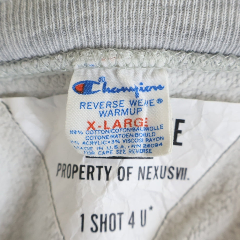 CHAMPION(チャンピオン) ×NEXUSVII REVERSE WEAVE ネクサスセブン リバースウィーブ トリコタグ フード後付け COLBY フロントプリント プルオーバーパーカー グレー/カーキ
