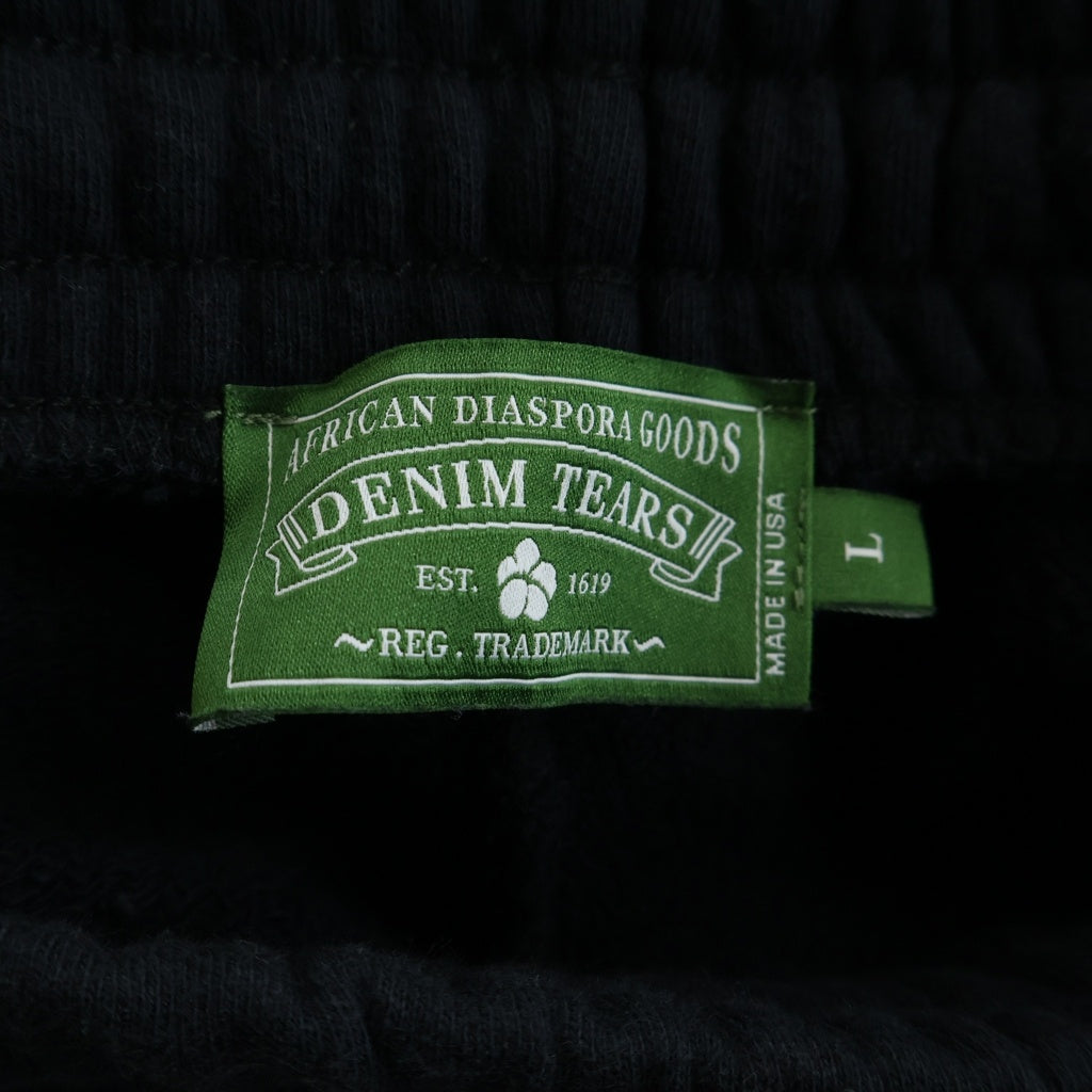 DENIM TEARS(デニムティアーズ) UNIVERSITY SWEATPANTS フラワーロゴ スウェットパンツ コットン ブラック