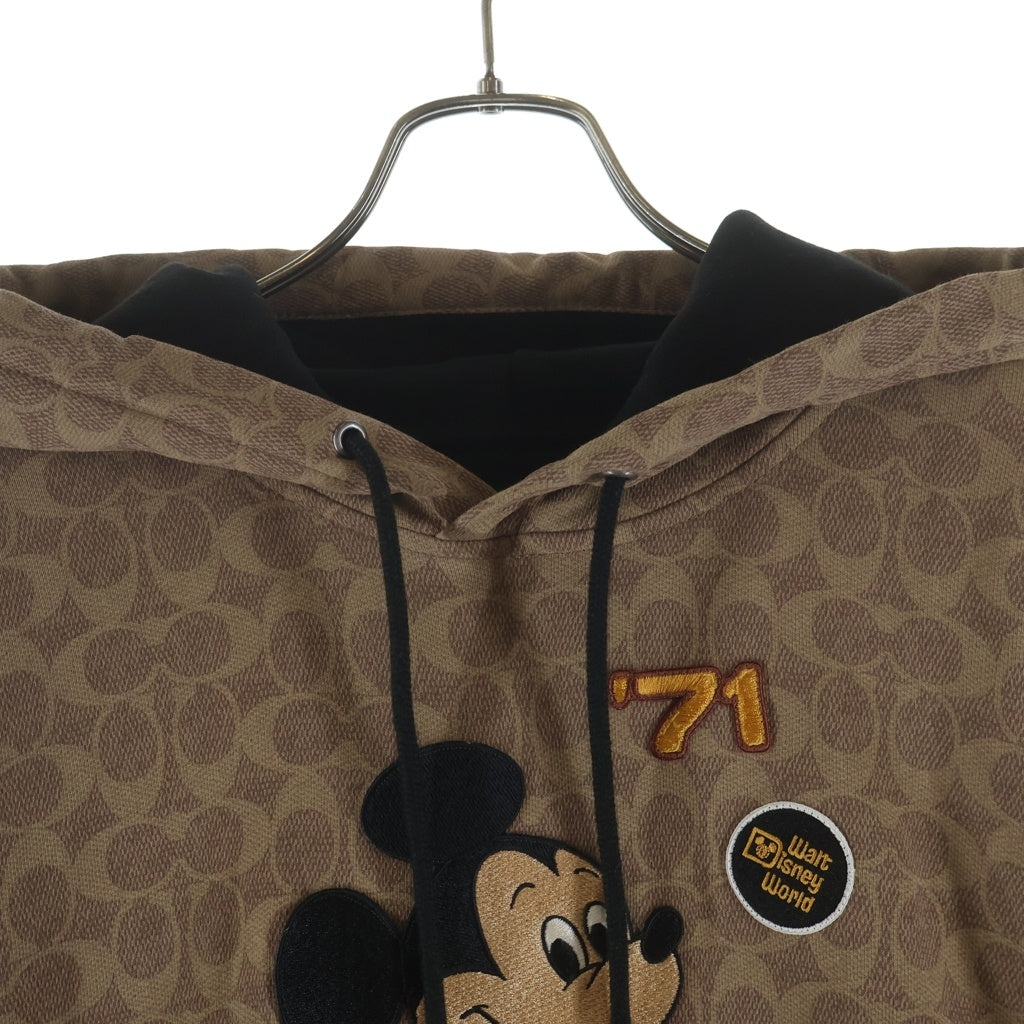 COACH(コーチ) ×DISNEY ミッキーマウス シグネチャー フーディー プルオーバーパーカー ブラウン C9479