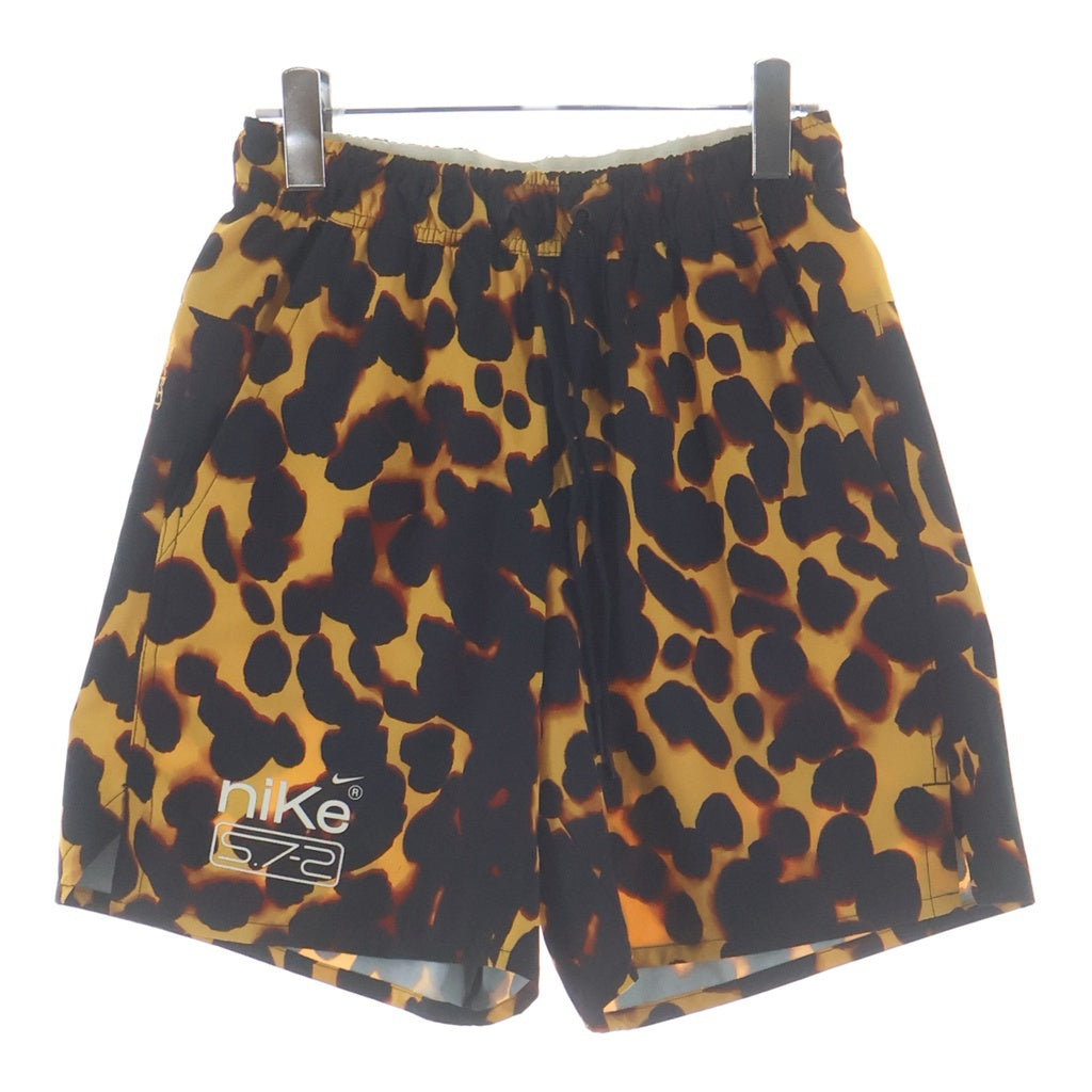 NIKE(ナイキ) 7UL アンリミテッド スタジオ ドライフィット ハーフパンツ ショーツ オレンジ FN3322-717