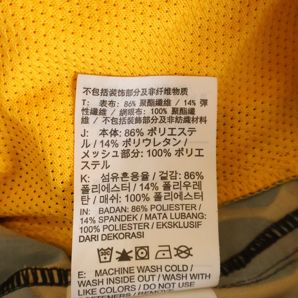 NIKE(ナイキ) 7UL アンリミテッド スタジオ ドライフィット ハーフパンツ ショーツ オレンジ FN3322-717