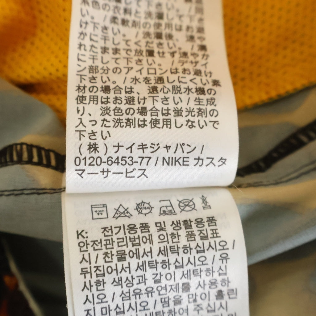NIKE(ナイキ) 7UL アンリミテッド スタジオ ドライフィット ハーフパンツ ショーツ オレンジ FN3322-717