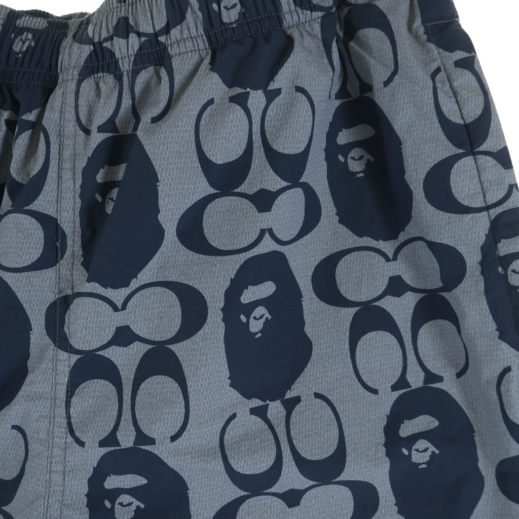 A BATHING APE(アベイシングエイプ) ×COACH コーチ シグネチャーロゴプリント ウエストリブ ハーフパンツ ショーツ ネイビー 001SPH731901C
