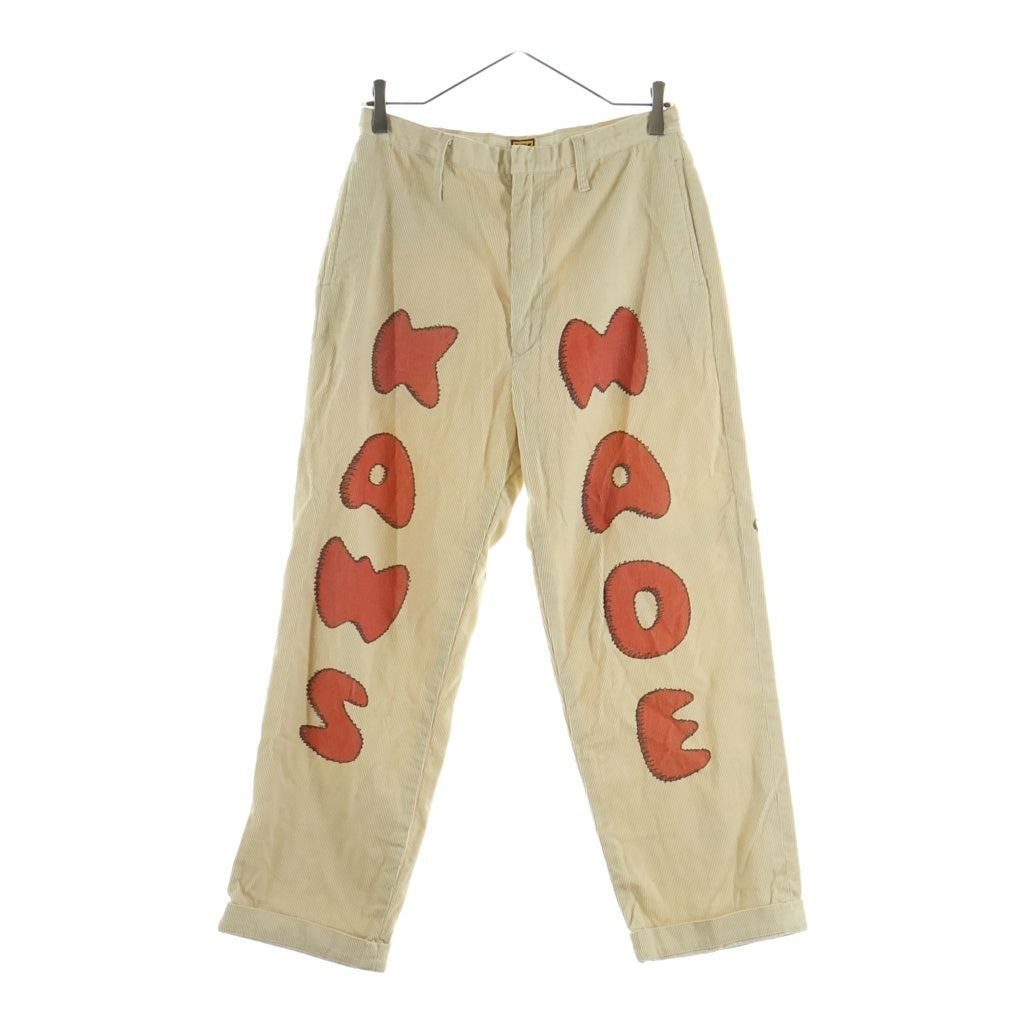 HUMAN MADE(ヒューマンメイド) ×KAWS CORDUROY PRINT PANTS カウズ ロゴプリント コーデュロイパンツ ベージュ