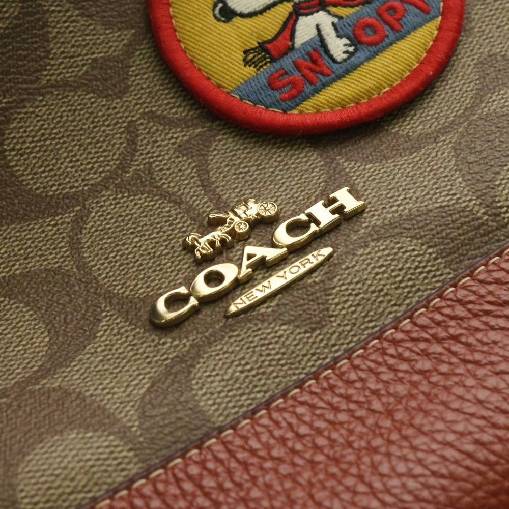 COACH(コーチ) スヌーピーコラボ リュックサック バックパック ベージュ×オレンジ ゴールド金具 PVC×レザー