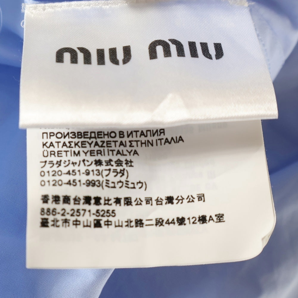 miumiu(ミュウミュウ) 24SS ロゴ 裾カットオフ ボタンダウン ポプリン長袖シャツ ブルー MK1659 SAM1 レディース