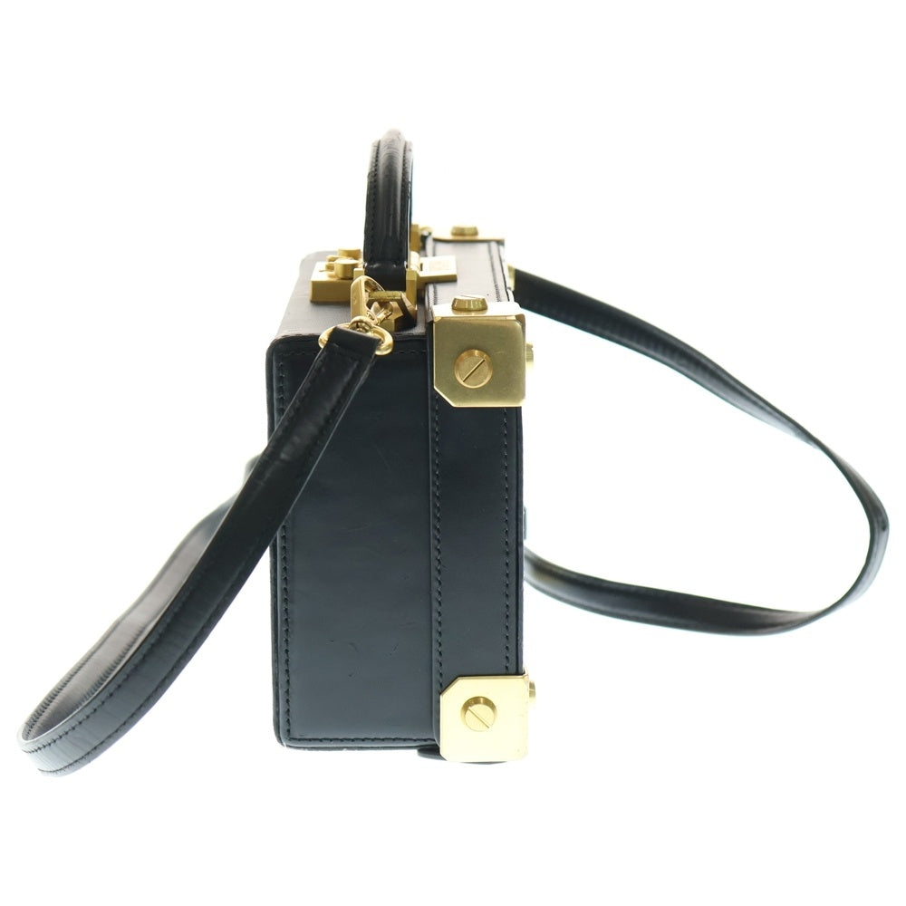 MCM(エム シー エム) ヴィセトス ロゴプレート スタッズ レザー 2WAY ミニ トランク ショルダーバッグ ゴールド金具 ブラック