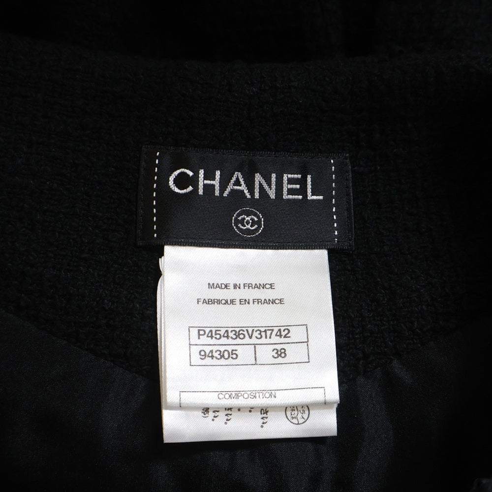 CHANEL(シャネル) ココマーク ロゴプレート コットン ツイード ミディアム フレア スカート ブラック レディース P45436V31742