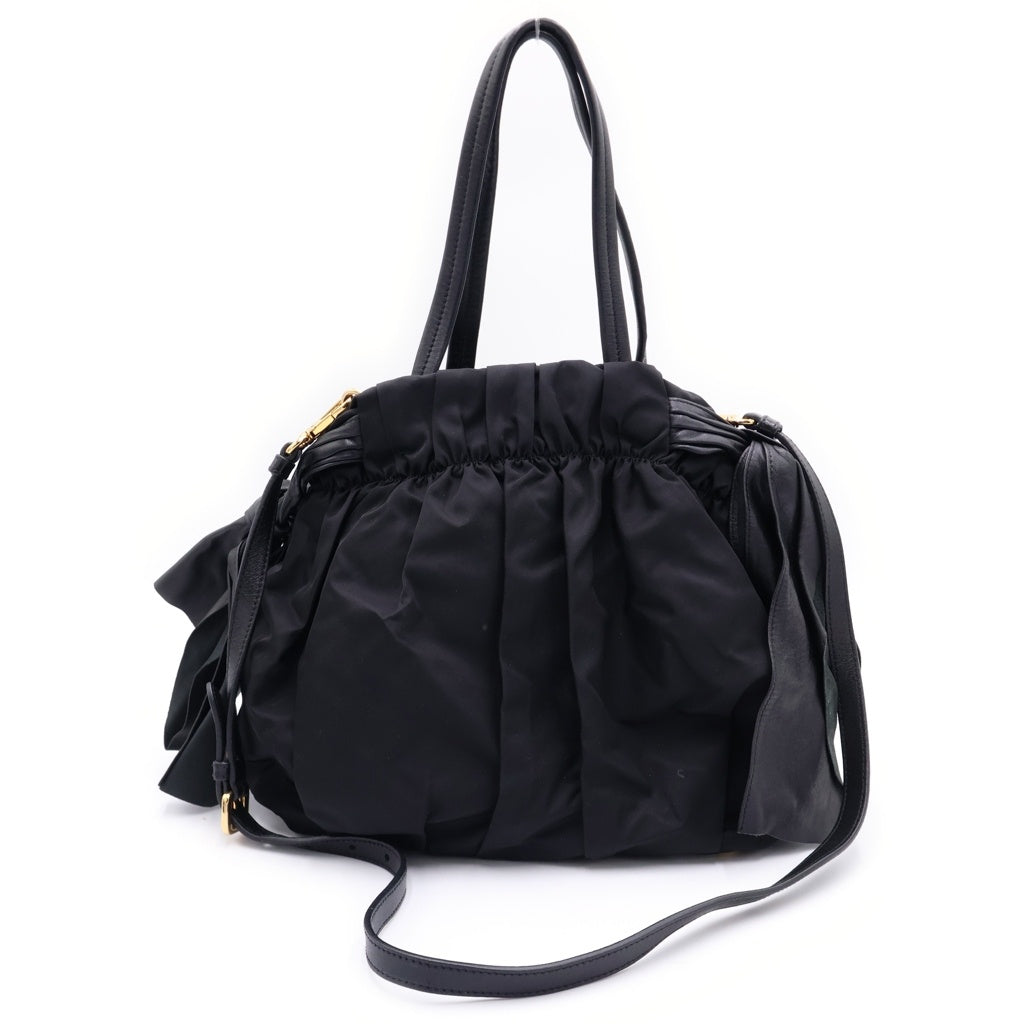 PRADA(プラダ) テスートナイロン サイドリボン パイソン柄 プリントハンドバッグ ブラック ゴールド金具 レディース