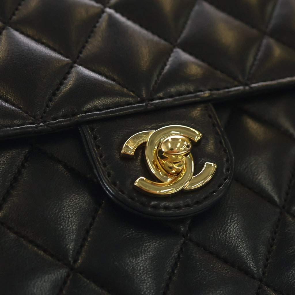 CHANEL(シャネル) マトラッセ22 プッシュロック シングルフラップシングルチェーンショルダーバッグ ブラック ラムスキン ゴールド金具 レディース
