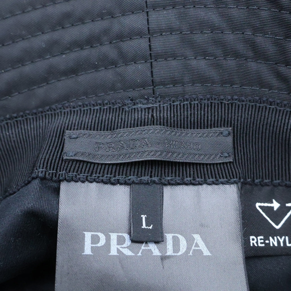 PRADA(プラダ) RE-NYLON リナイロン トライアングルロゴプレート バケットハット 帽子 ブラック 2HC137 レディース