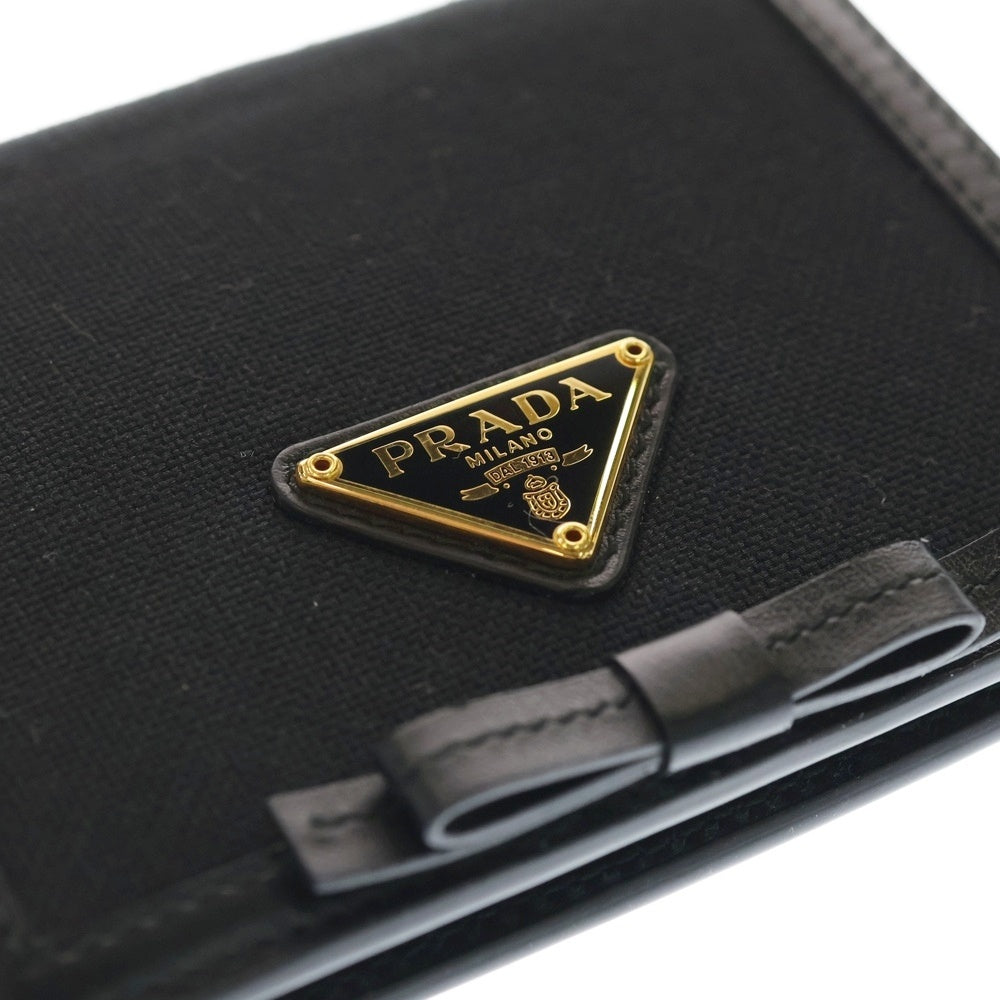 PRADA(プラダ) リボン ロゴプレート 2つ折り財布 ブラック レザー