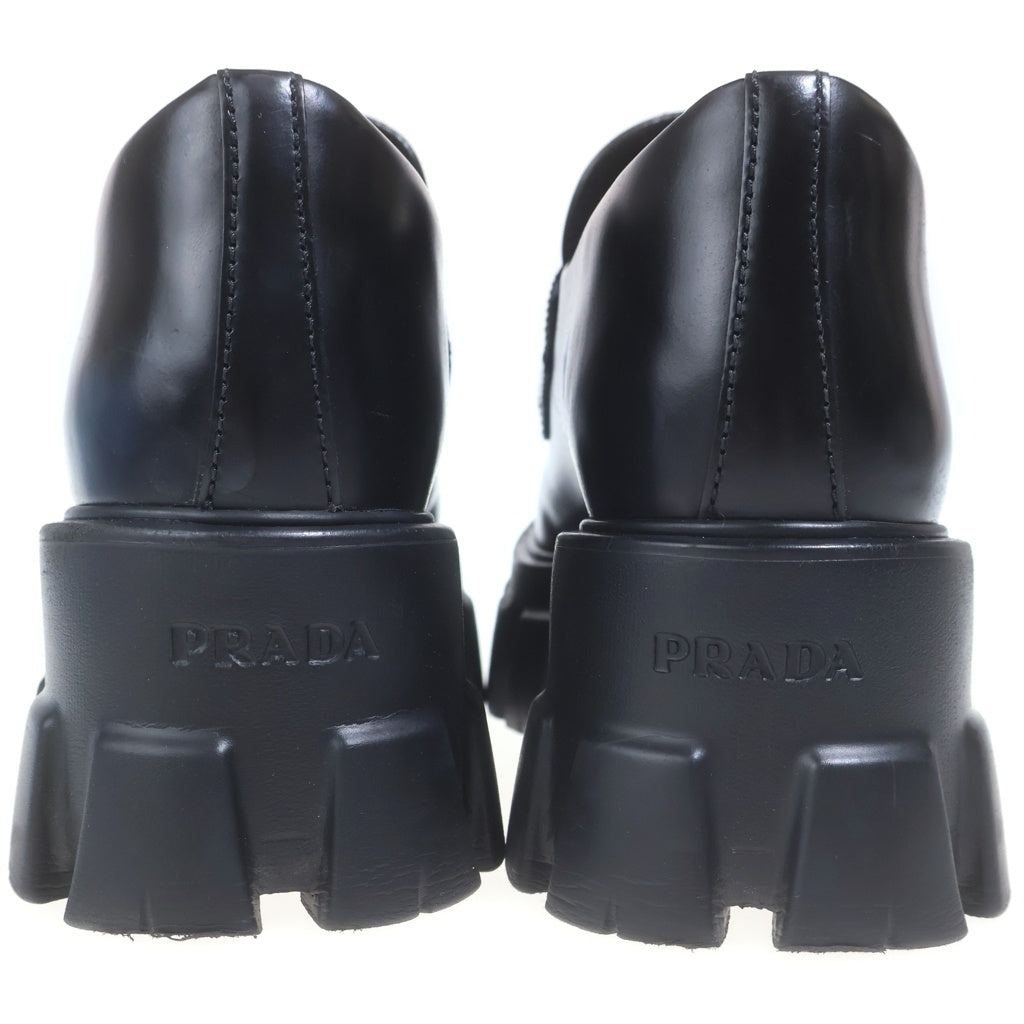 PRADA(プラダ) プラダ モノリス トライアングルロゴ レザーローファー ブラック 36 1/2 649 レディース
