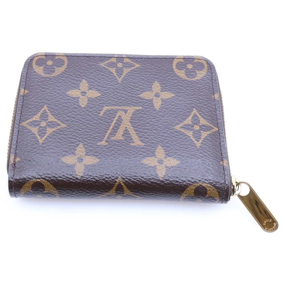 LOUIS VUITTON(ルイヴィトン) モノグラム ジッピーコインパース ブラウン PVC M60067 レディース