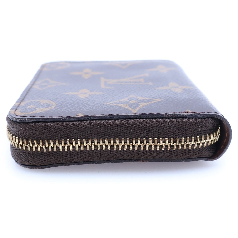 LOUIS VUITTON(ルイヴィトン) モノグラム ジッピーコインパース ブラウン PVC M60067 レディース