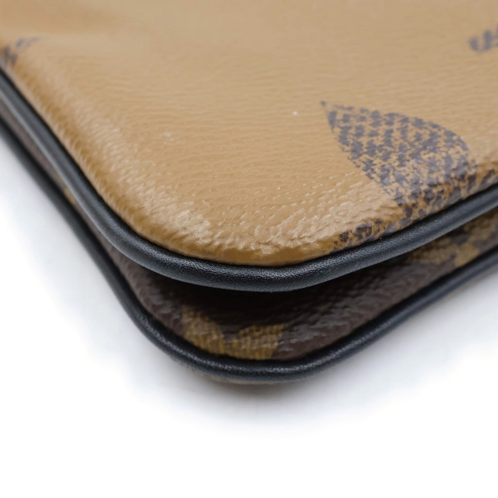 LOUIS VUITTON(ルイヴィトン) モノグラム ジャイアント リバース ポシェット ドゥーブル ジップ ブラウン×ブラック PVC×レザー M69203 レディース