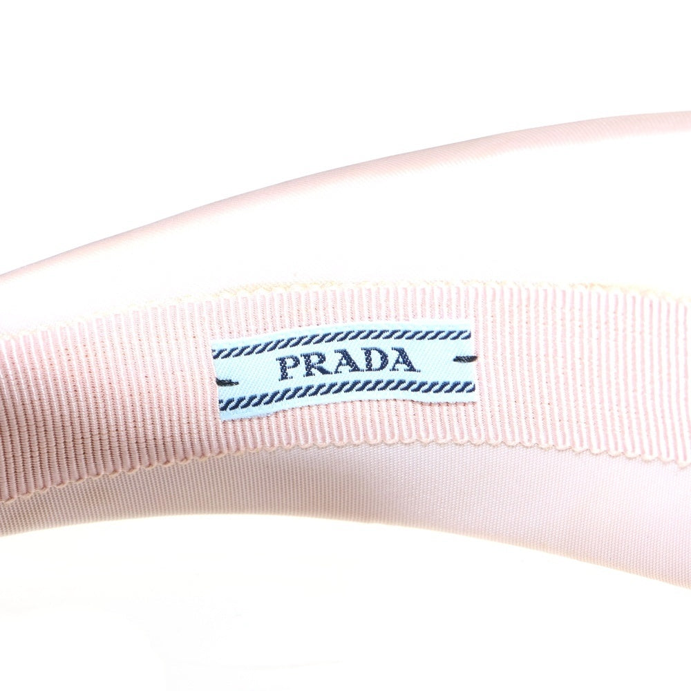 PRADA(プラダ) カチューシャ トライアングルロゴ ピンク ナイロン ヘアアクセサリー 1IH016