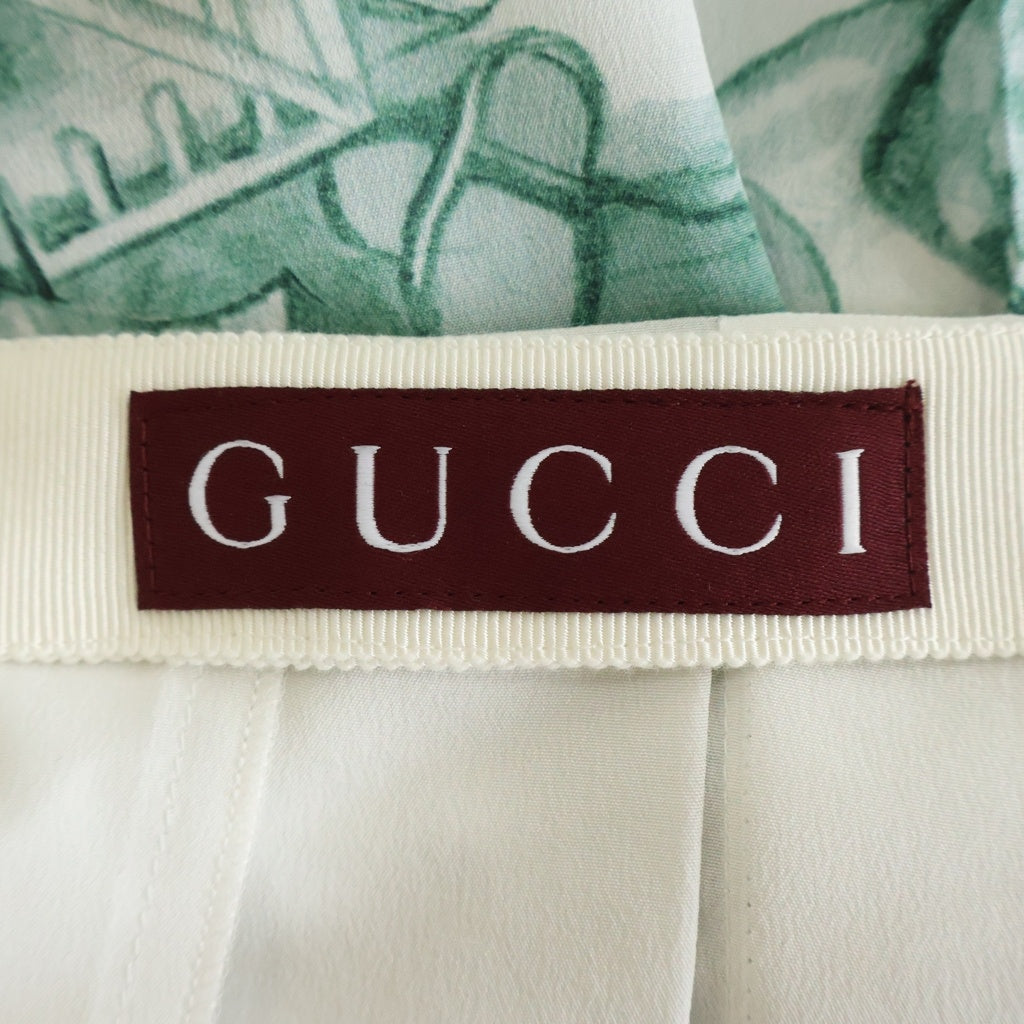 GUCCI(グッチ) ×ヒグチユウコ プリーツロングスカート 魔法の森 シルク ホワイト/グリーン 865513 ZAUWT レディース