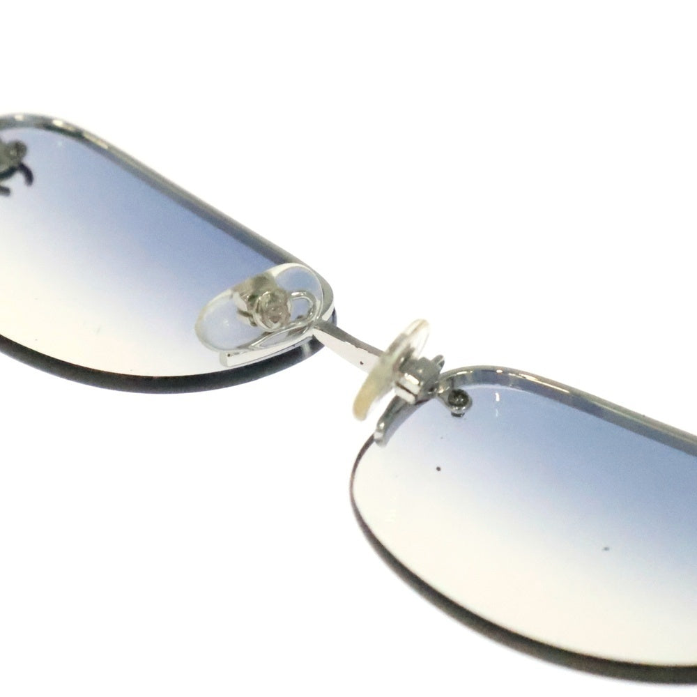 CHANEL(シャネル) ココマーク サングラス リムレス シルバーフレーム ブルーレンズ グラデーション 4099