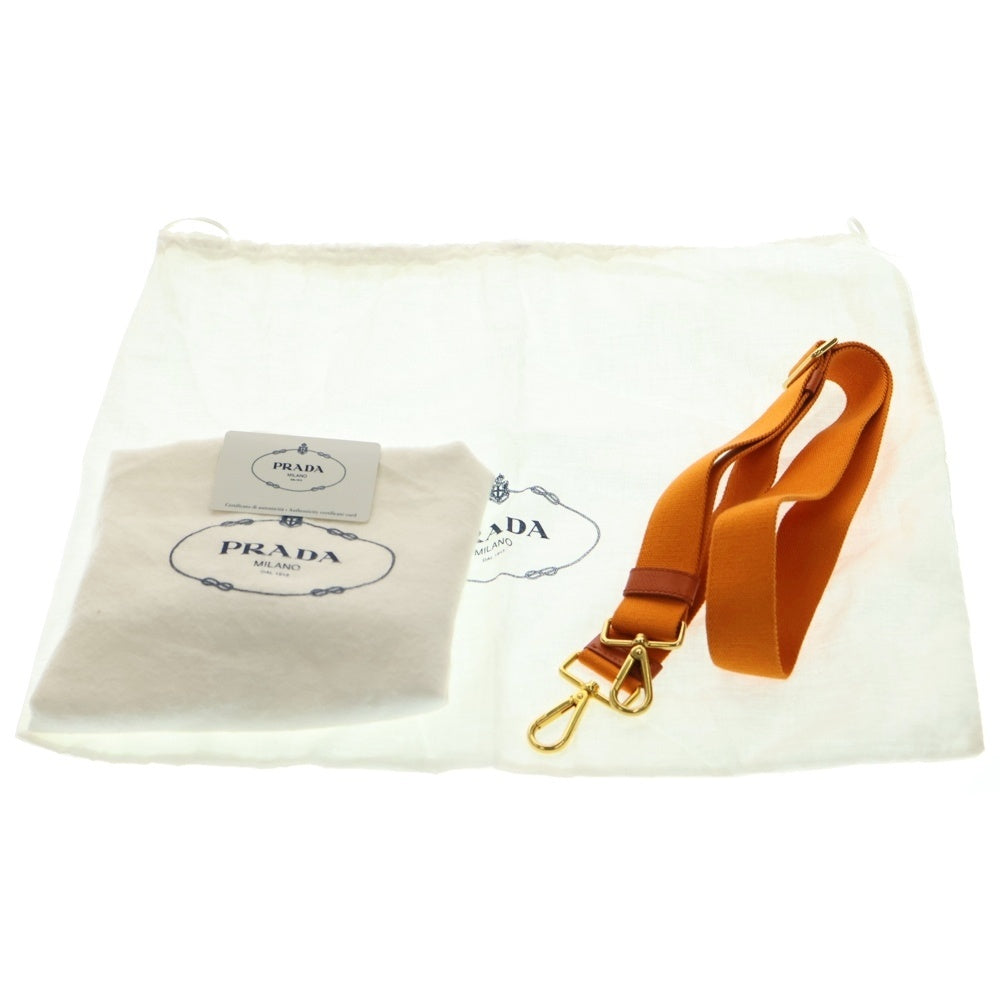 PRADA(プラダ) カナパ ミニ トライアングルロゴプレート キャンバス 2WAY ハンド ショルダー トートバッグ ゴールド金具 オレンジ B2439G