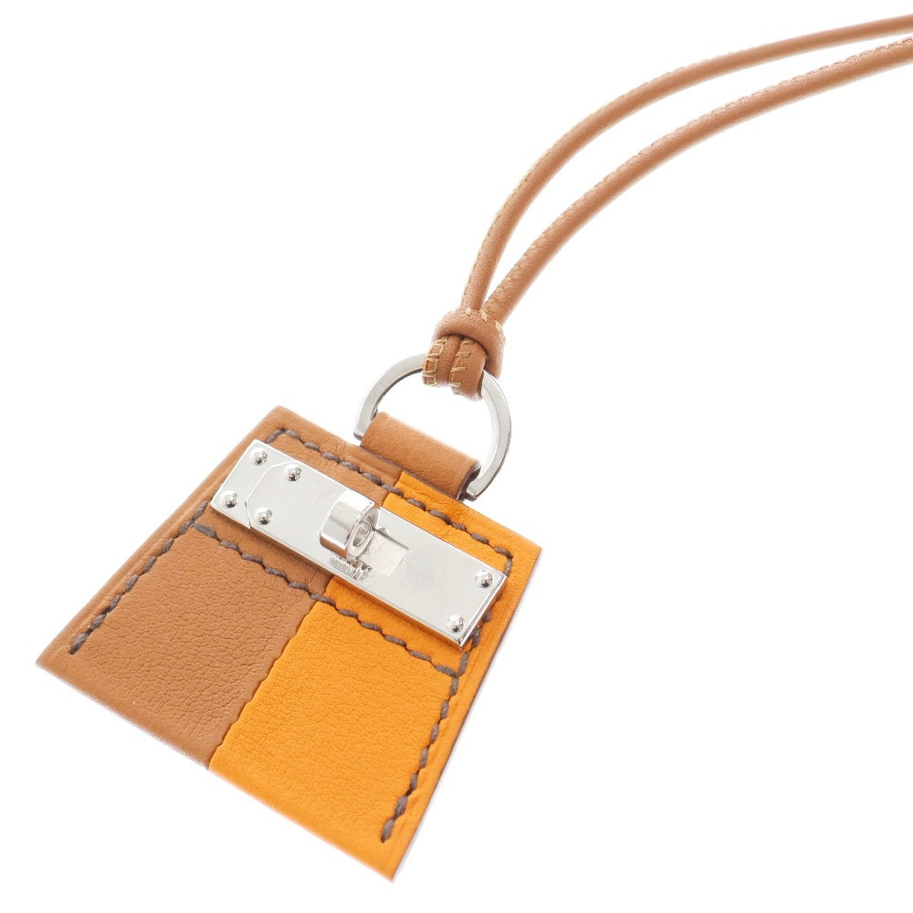 HERMES(エルメス) モンプティケリーPM ネックレス ゴールド×オレンジ スイフト シルバー金具 チャーム アクセサリー