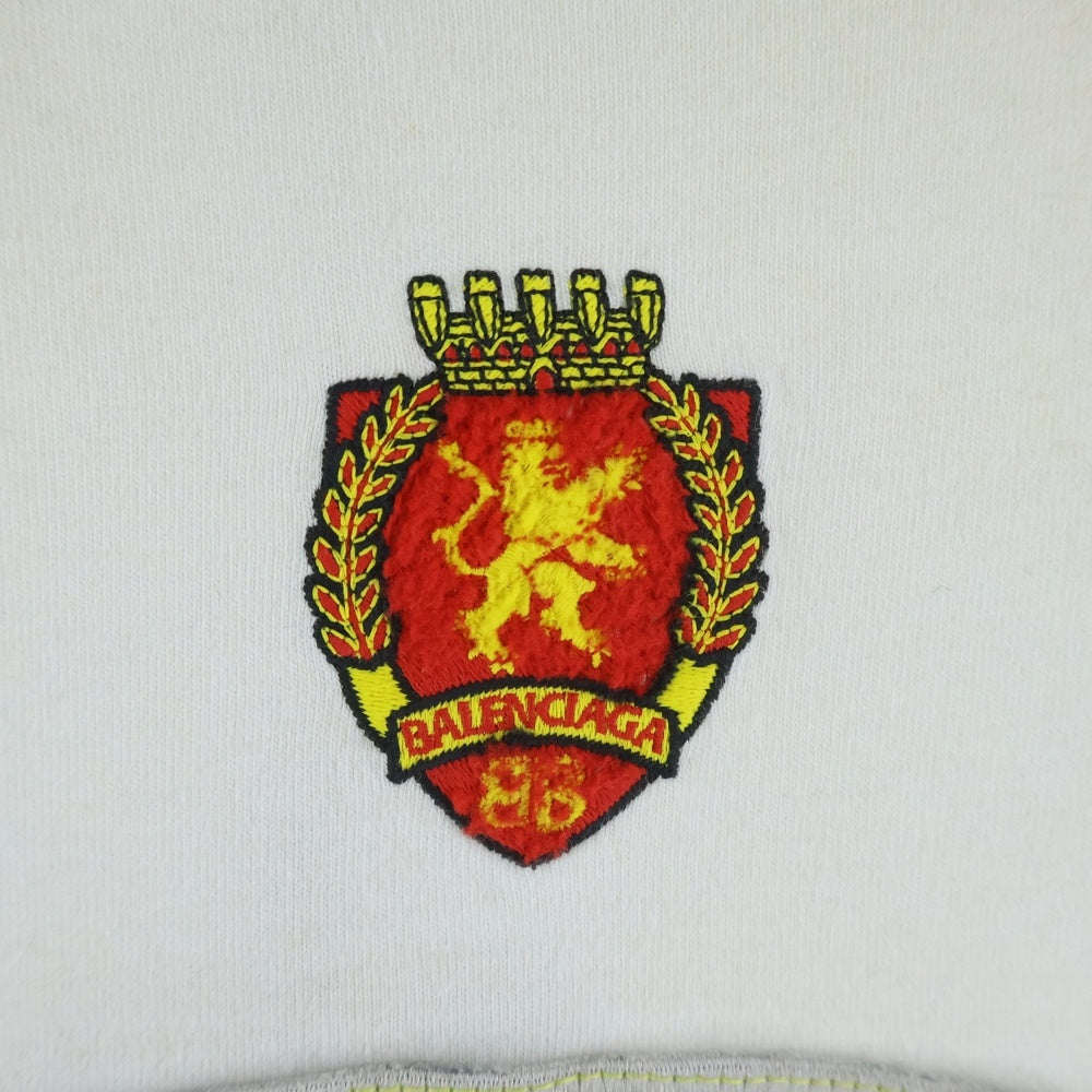 BALENCIAGA(バレンシアガ) 23SS SKATER OVERSIZED クラッシュダスト加工 スケーターワッペンロゴ半袖カットソー Tシャツ ホワイト 739028 TOVN2